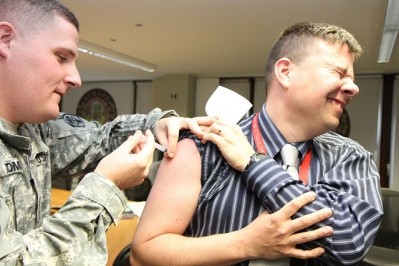 A US army engineer receives a flu vaccine in 2011 (Image: USACE/CC)
