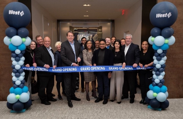 West Pharmaceutical Services' leadership team and employees cut the ribbon to officially open new research and development lab in Radnor, PA.